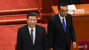 China drops GDP goal, pledges higher spending as parliament starts