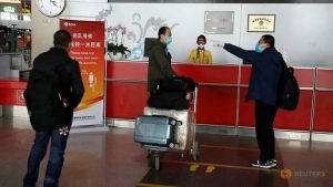 Beijing cuts flights, extends movement curbs as COVID-19 cases rise