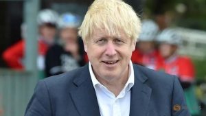 COVID-19 surge? Warning light is flashing, UK PM Johnson says