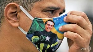 Bolsonaro fans applaud his maverick COVID-19 response