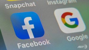 Australia unveils law forcing tech giants to pay for news