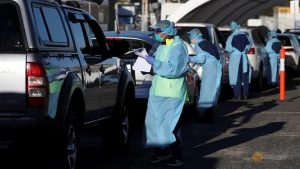 Australia reports record number of daily COVID-19 cases, 13 deaths