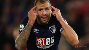 Football: Bournemouth to take late call on Cook for Spurs test