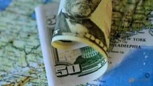 Dollar in tight range ahead of US services sector data