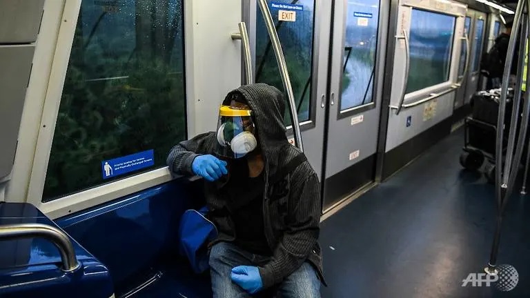 US divided over mask wearing and schools reopening as COVID-19 cases surge