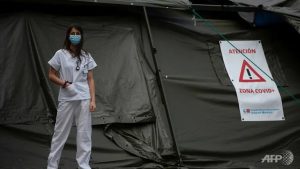 Spain’s exhausted medics demand post-virus job security