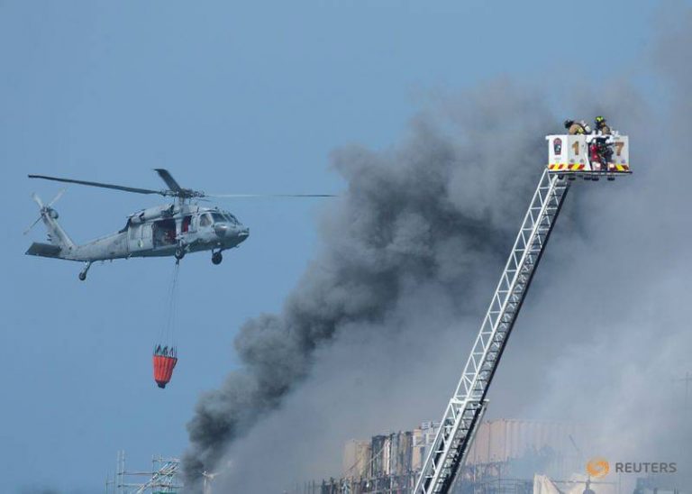 US Navy battles for second day to save burning warship in San Diego