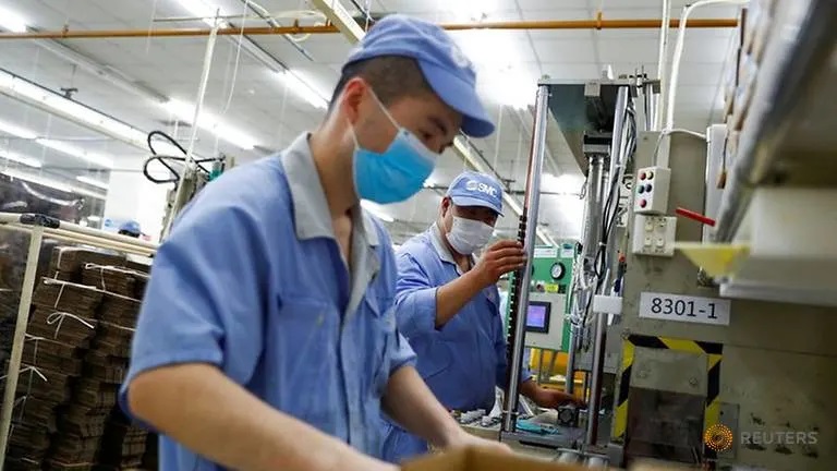Strain on global manufacturing eases as euro zone returns to growth