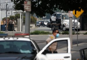 Gunman wounds two Los Angeles County deputies in ambush attack on their car