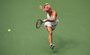 Former champion Kerber reaches second round in New York