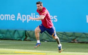 Messi back in full training with Barca