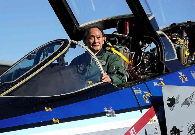 Japan PM Suga under fire for year-end dinners as Covid-19 cases mount