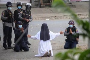 ‘Shoot me instead’: Myanmar nun pleads with junta forces