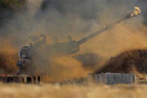 Israel fires artillery into Gaza, Palestinian rocket attacks persist