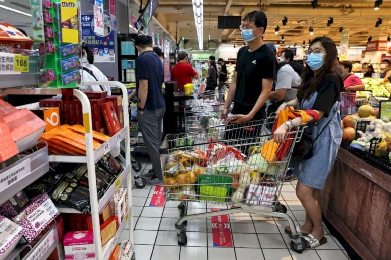 Taiwan urges no panic buying as new Covid-19 rules kick off