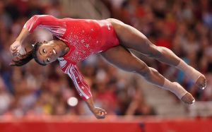 Gymnastics: ‘Super Simone’ books ticket to second Olympics