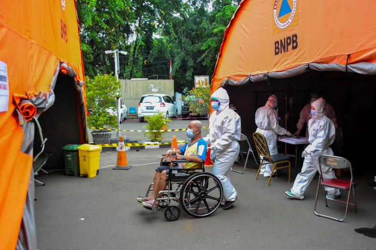 Indonesia reports record Covid-19 cases and deaths