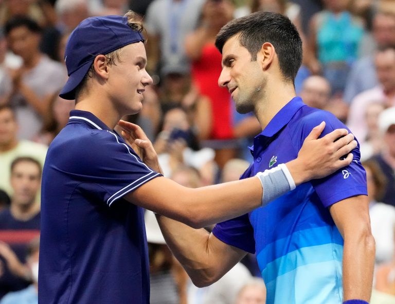 Rune loses to Djokovic but wins over fickle New York crowd