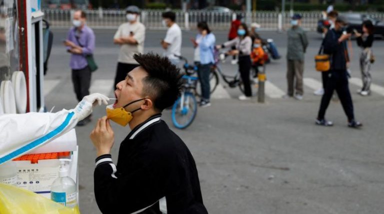 Beijing Covid-19 spike prompts mass testing, panic buying