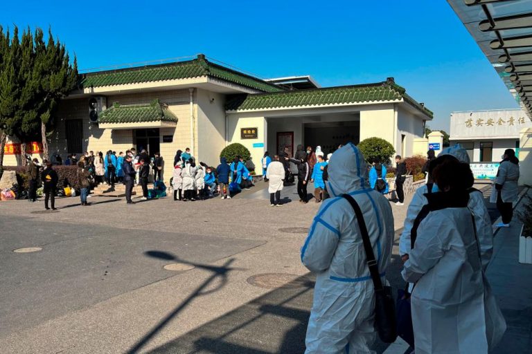 Beijing, Shanghai residents back to work as China eases into living with COVID-19