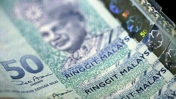 Malaysia expects ringgit to rise this year, rules out currency peg